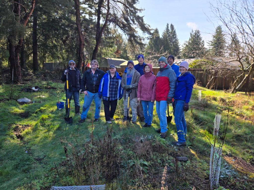 Volunteers helping to plant the greenbelt between Donnelly Dr. and 48th Court.